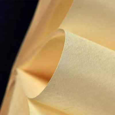 Close-up view of 100% organic bamboo fiber fabric texture, showing the natural biodegradable material for eco-friendly wet wipes.