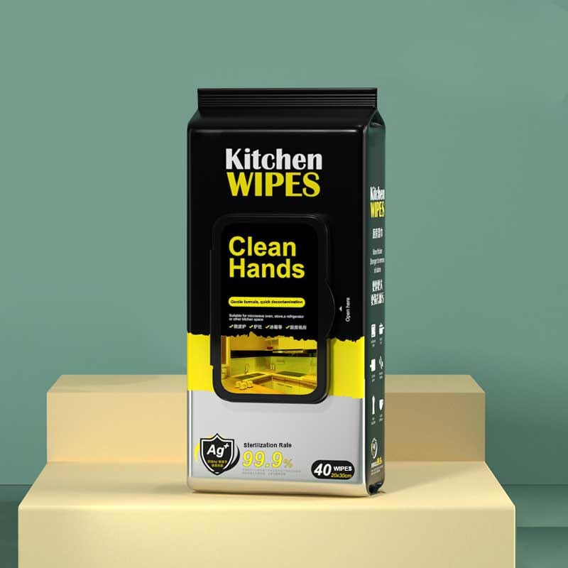 Custom antibacterial kitchen wipes wiping grease and stains off a countertop