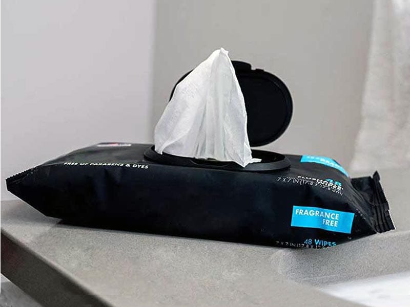 SYWIPE private label flushable adult wet wipes in a black soft pack with an open plastic lid dispensing a wipe